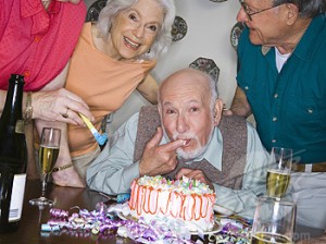 Portrait of a group of senior people celebrating a birthday